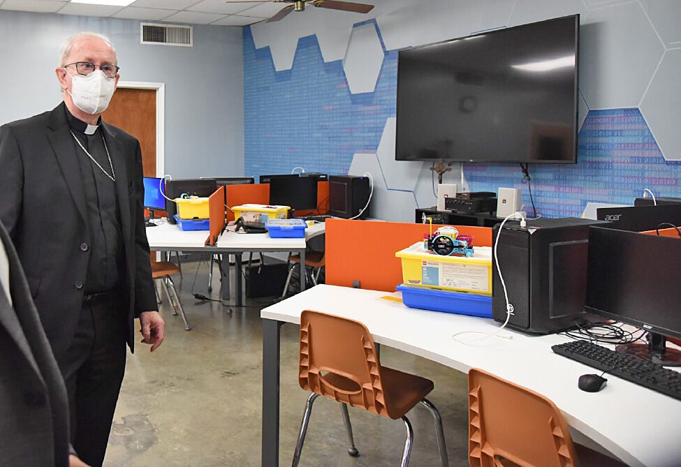 Bishop John Noonan gets a tour of renovations to the Science Lab